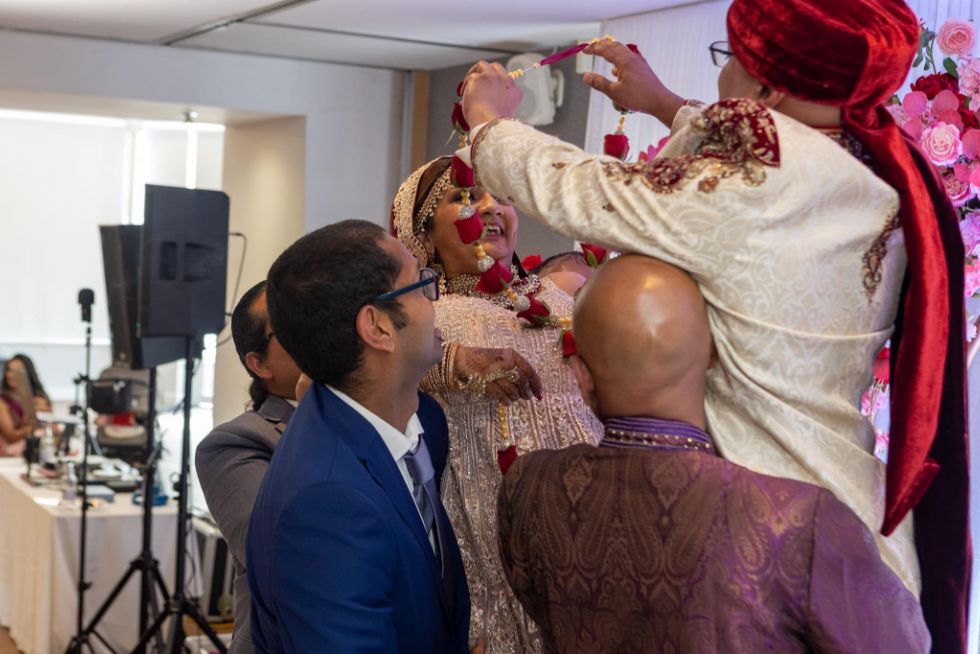 Multicultural Hindu and Sikh wedding ceremony