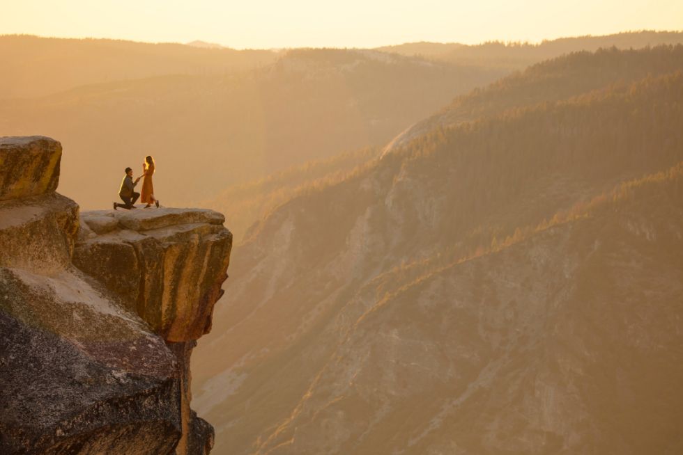 marriage proposal couple on mountaintop