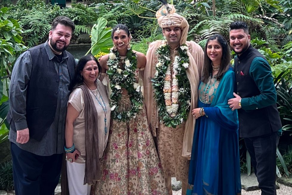 multicultural wedding couple, guests and celbrant