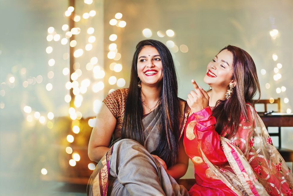 indian lgbtq+ couple sitting together